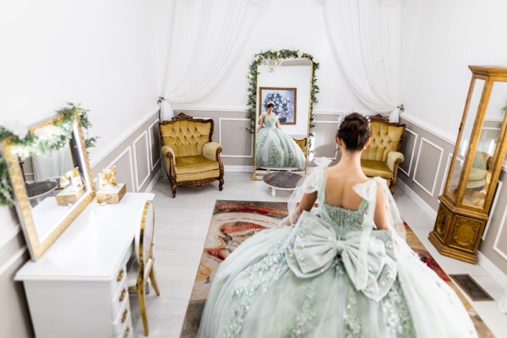 Quinceañera reflection in mirror at our Utah Valley event venue in Orem