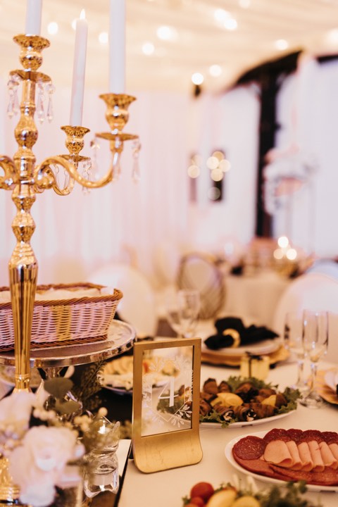 Gold candelabra reception detail at our Orem, Utah event venue