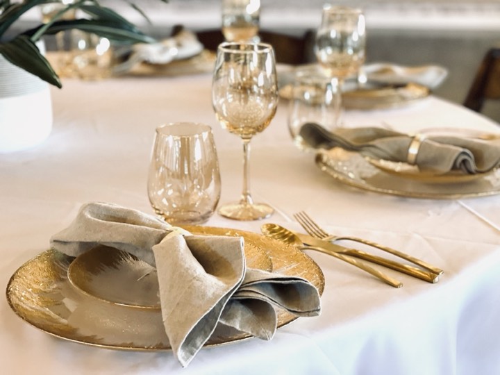 Gold charger plate table setting at our Utah Valley event venue in Orem