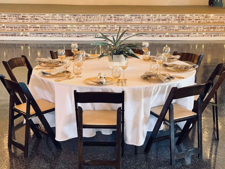 Round table setup with chairs at our Utah Valley event venue in Orem