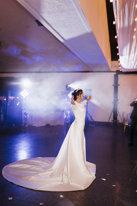 Bride in smoke and stage lighting at our Utah Valley event venue in Orem