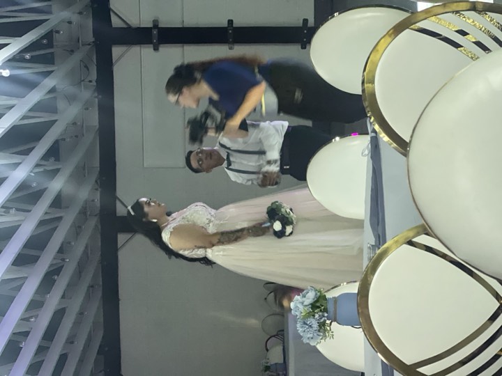 Bride with videographer at our Utah Valley event venue in Orem