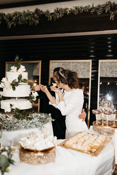Cake cutting moment at our Orem, Utah wedding and quinceañera venue