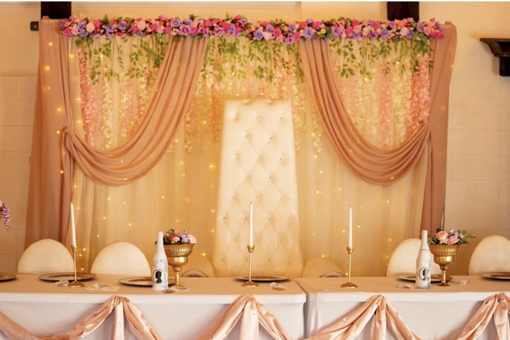 Elegant floral backdrop at our Utah Valley event venue in Orem