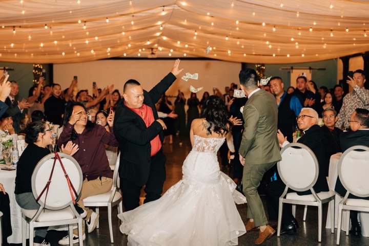Money dance, bills flying at reception at our Orem, Utah event venue