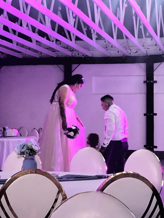 Wedding moment on stage at our Orem, Utah event venue