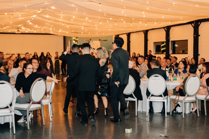 Wedding reception floor, guests celebrating at our Utah Valley event venue in Orem