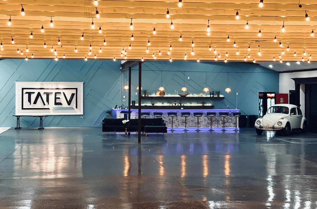 The main event hall with string lit ceilings and the bar at our Orem, Utah venue